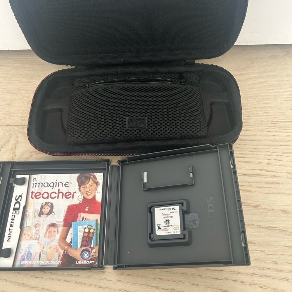 Nintendo switch lite casewith storage for games new.   Three games included‍‍‍‍‍